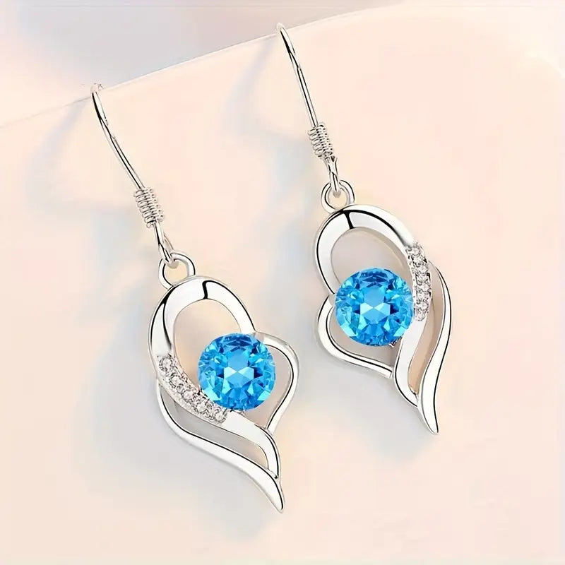 Wiszące kolczyki Serce zaćmienia | Białe złoto